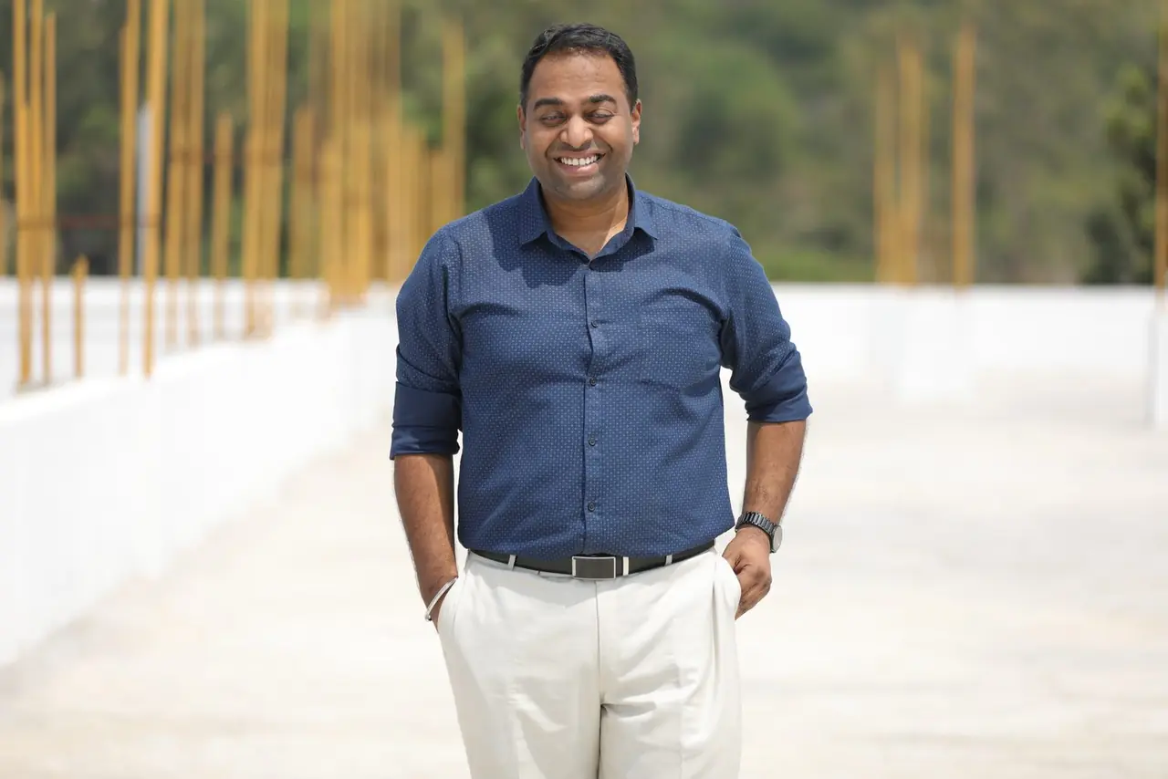 Bharath G C, Executive Director, on the rooftop at Bachenahatti